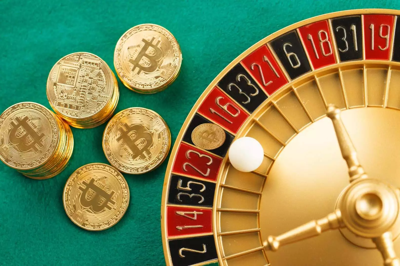 White ball on Bitcoin on roulette casino.