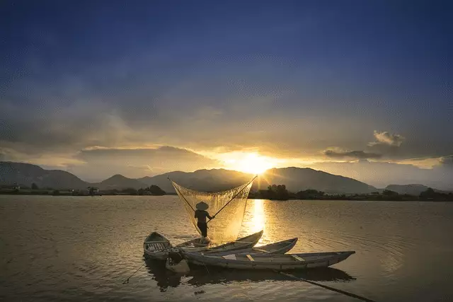 A fisherman in Mekong River
